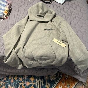 Small BNWT essentials fear of god hoodie